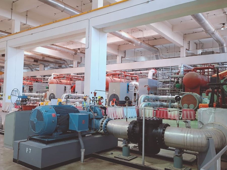 Chiller plant with retrofitted compressor piping